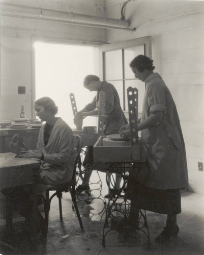 Scripps pottery students in studio, Scripps College