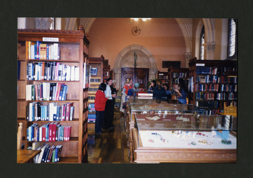 Scripps students and staff mingling and snacking in Denison Library, Scripps College