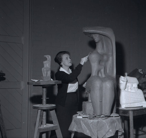 Woman sculpting, Scripps College