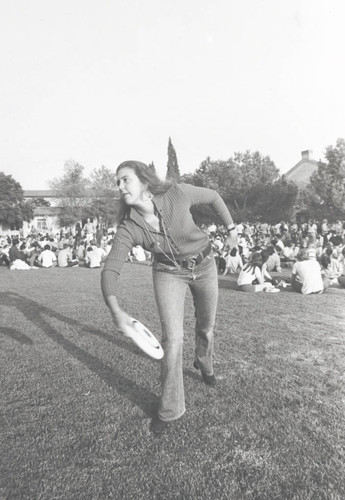 Student with frisbee, Scripps College