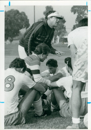 Athletes sitting on grass, Claremont McKenna College