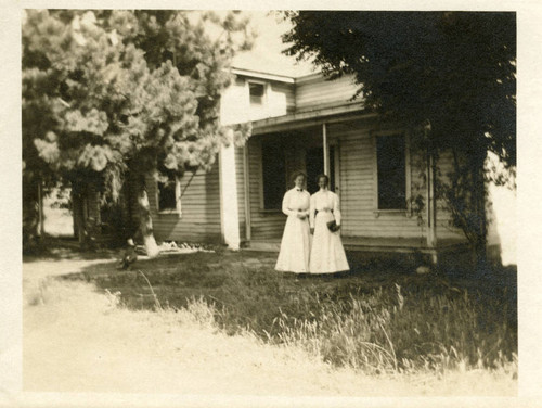 Women outside a house, Pomona College