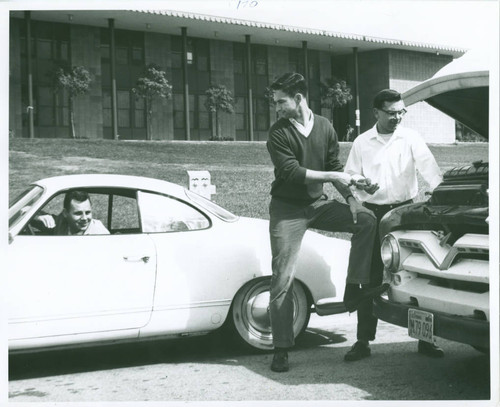 Students repairing automobile, Harvey Mudd College