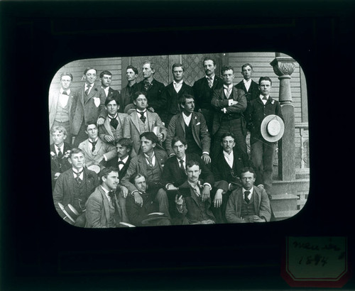 Students on the porch of Holmes Hall, Pomona College