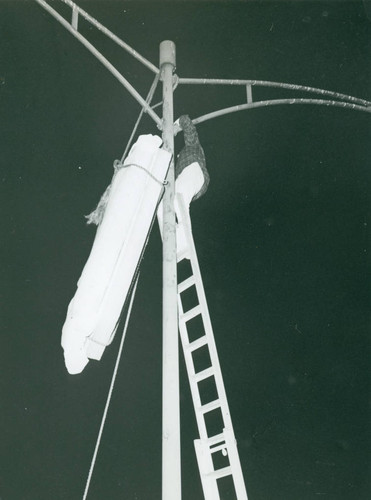 Mattress suspended from lamppost, Harvey Mudd College