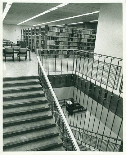 Stairs and shelves inside Seeley W. Mudd Library