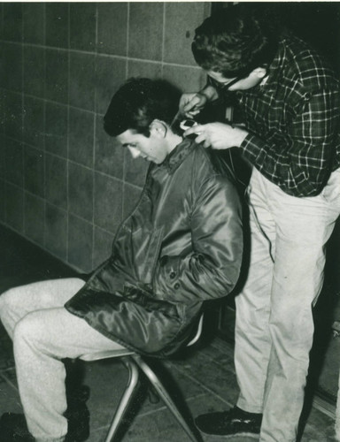 Student getting haircut, Harvey Mudd College