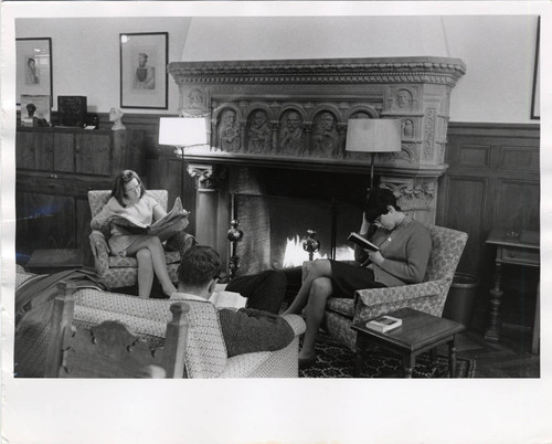 Students reading by fireplace, Scripps College