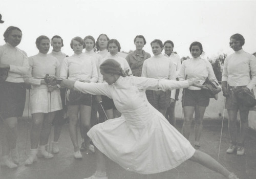 Helene Mayer with fencing students, Scripps College