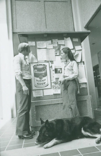 Students and Dog outside McManus Hall