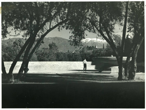 Bosbyshell Fountain with snow-covered mountains, Pomona College