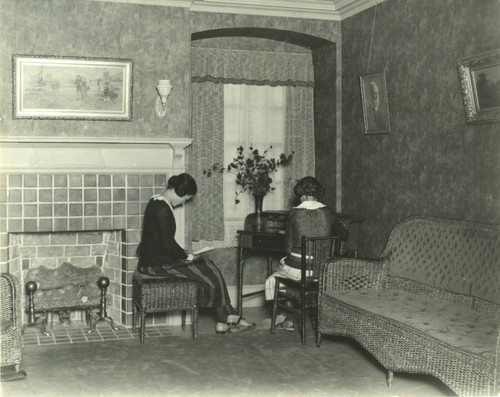 Two women studying, dormitory room, Pomona College