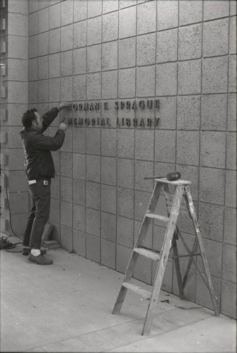 Sprague Library sign installation, Harvey Mudd College