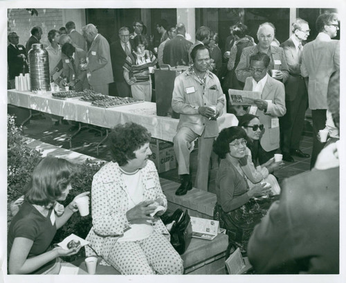 Individuals gather outside a building, Claremont McKenna College