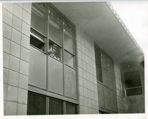 Student points out window, Harvey Mudd College