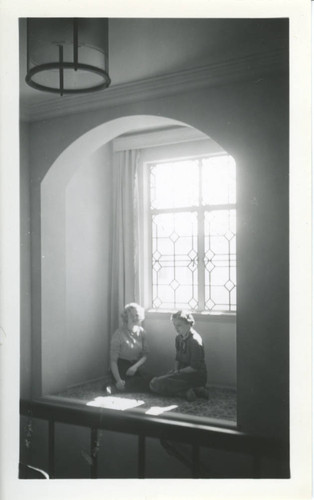 Two women sitting in an alcove, Pomona College