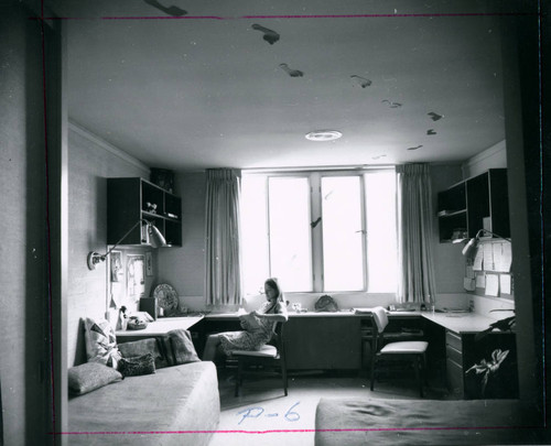 Student reading in a dorm room, Pitzer College