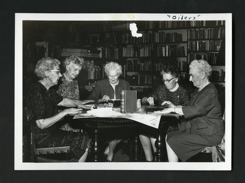 The "Oilers" volunteers refurbishing books in Denison Library, Scripps College