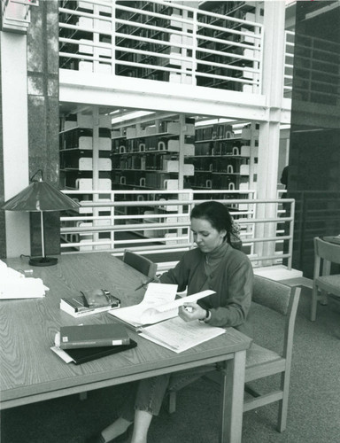 Student studying in Mudd Library