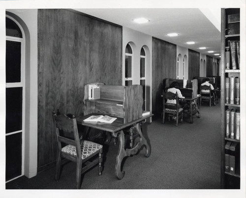 Students working at carrels, Scripps College