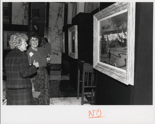 Women observing artwork, Scripps College