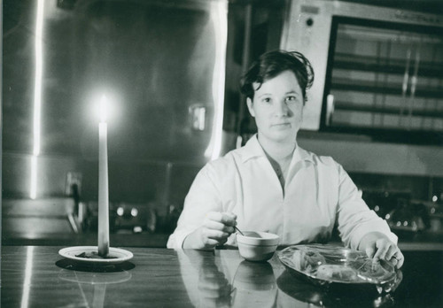 Cafeteria worker with candle, Harvey Mudd College