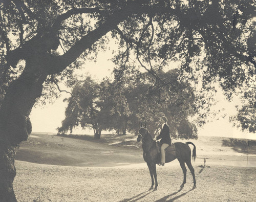 Student on horseback, Scripps College