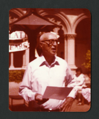 Dr. Richard Armour reading a poem at Jane Shanck's party, Scripps College