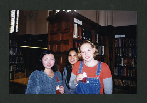 Scripps students drinking tea at Denison Library's 2000 Christmas tea, Scripps College