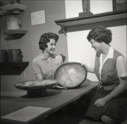 Two women with ceramic bowl, Scripps College