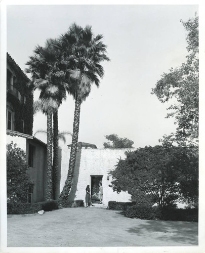 Women standing outside a dormitory, Pomona College