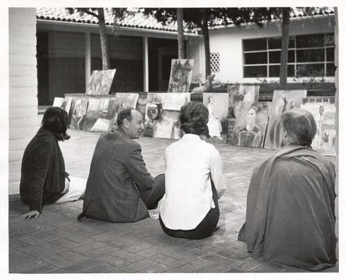 Professor Dike with students in Seal Court, Scripps College