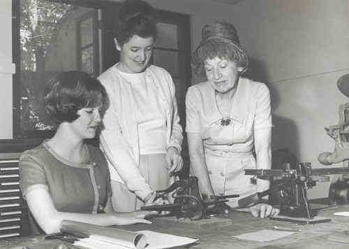 Students with printing equipment, Scripps College