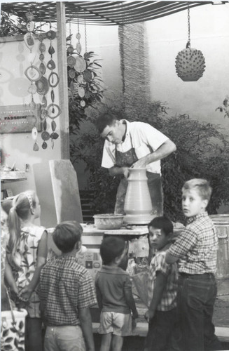 Children at ceramics demonstration, Scripps College