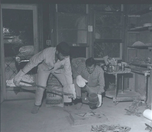 Men in sculpture studio, Scripps College