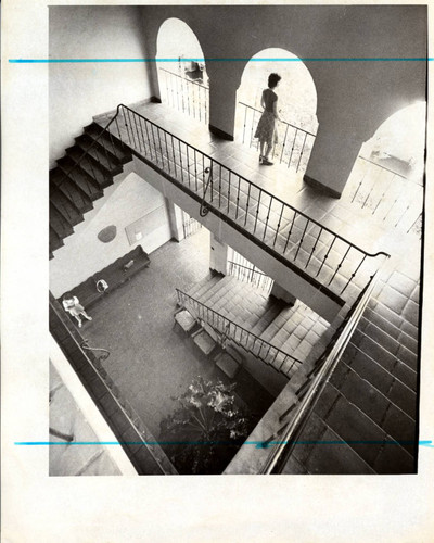 Students in Balch Hall stairwell, Scripps College