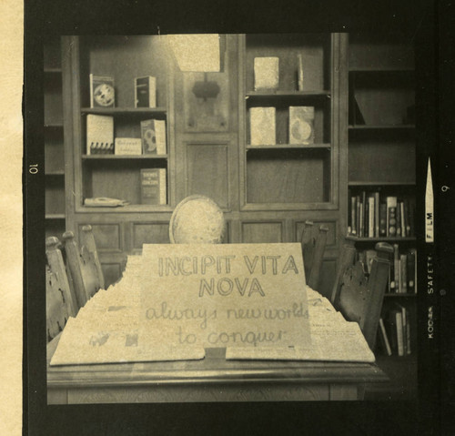 Incipit Vita Nova newspaper display in Denison Library, Scripps College