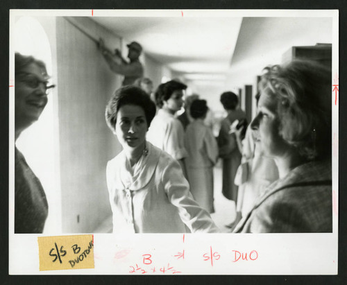 Women exploring the new upstairs interior of the Drake Wing of Denison Library, Scripps College