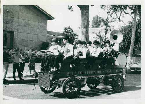 Brass band in antique car, Harvey Mudd College