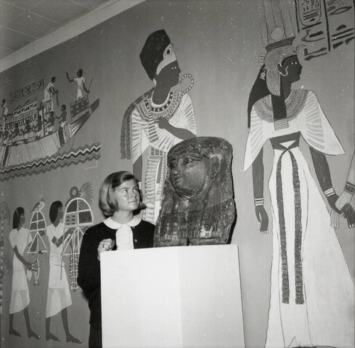 Woman with Egyptian sculpture, Scripps College