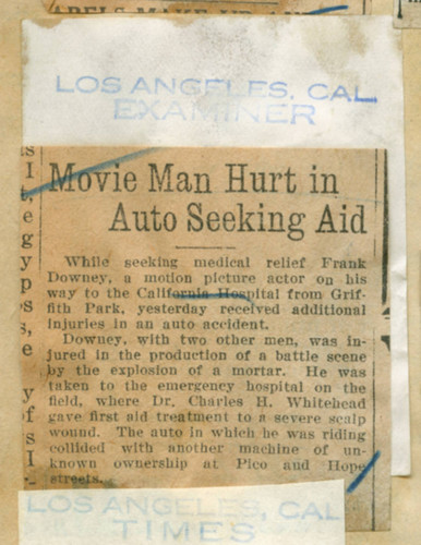 Movie man hurt in auto seeking aid