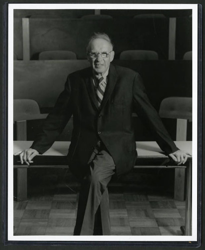 Photograph of Peter Drucker in auditorium