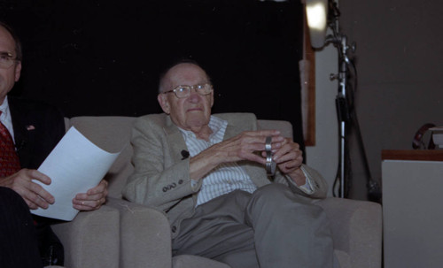 Peter Drucker sits next to John W. Bachmann