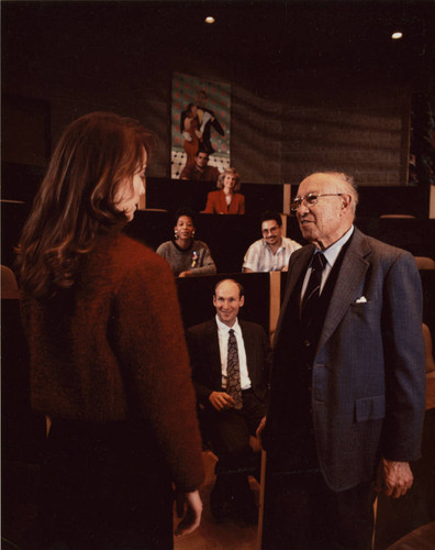 Peter Drucker in an auditorium