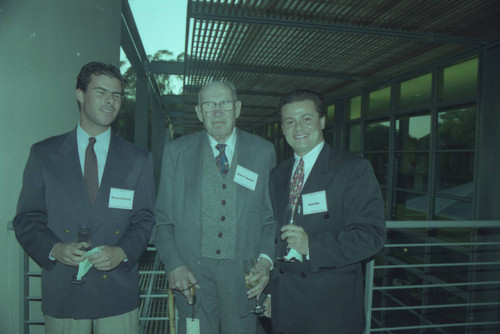 Peter Drucker standing between Nicolas Gutierrez and Raul Diaz