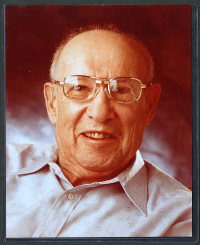 Close-up color portrait photograph of Peter Drucker