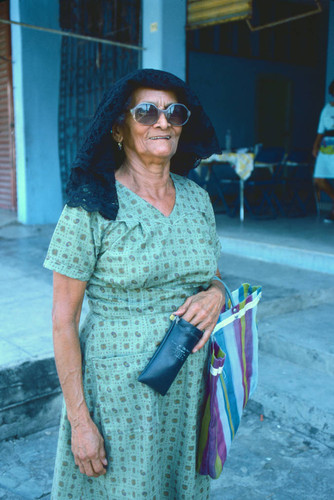 Old lady with church veil