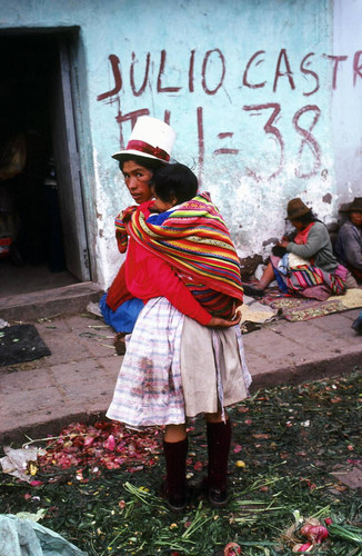 Woman carrying child