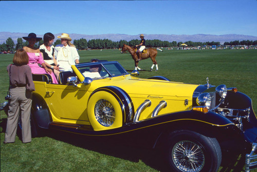 Celebrity wives on yellow excalibur