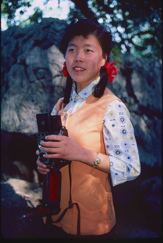 Woman with Rolleiflex camera